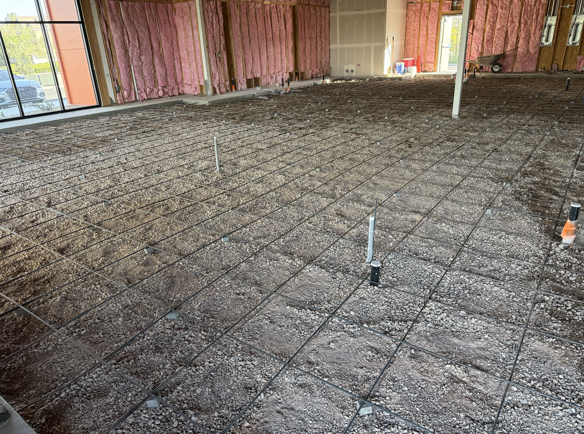 Slab preparation and rebar layout on an active build-out